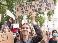 Youth protests at Parliament square against a new exam rating system which has been introduced in British education system - London, England...