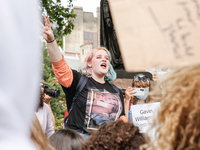 Youth protests at Parliament square against a new exam rating system which has been introduced in British education system - London, England...