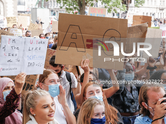 Youth protests at Parliament square against a new exam rating system which has been introduced in British education system - London, England...