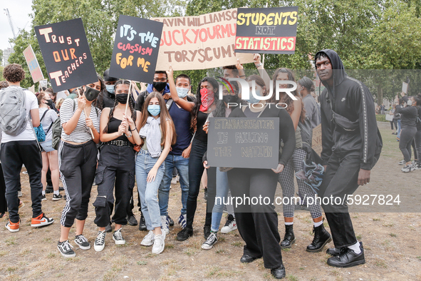 Youth protests at Parliament square against a new exam rating system which has been introduced in British education system - London, England...