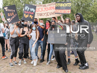 Youth protests at Parliament square against a new exam rating system which has been introduced in British education system - London, England...