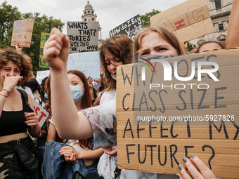 Youth protests at Parliament square against a new exam rating system which has been introduced in British education system - London, England...