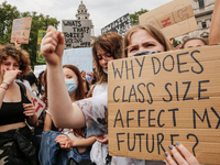 Youth protests at Parliament square against a new exam rating system which has been introduced in British education system - London, England...