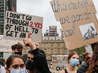 Youth protests at Parliament square against a new exam rating system which has been introduced in British education system - London, England...