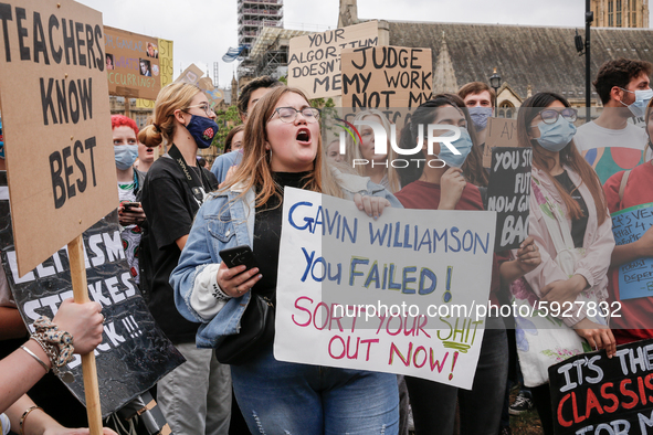 Youth protests at Parliament square against a new exam rating system which has been introduced in British education system - London, England...