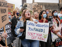 Youth protests at Parliament square against a new exam rating system which has been introduced in British education system - London, England...