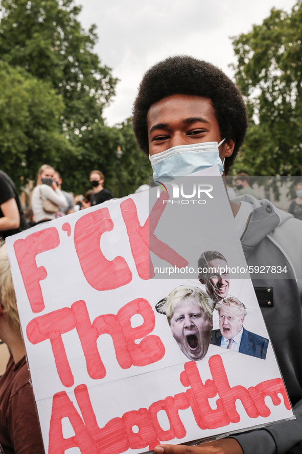 Youth protests at Parliament square against a new exam rating system which has been introduced in British education system - London, England...