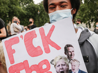 Youth protests at Parliament square against a new exam rating system which has been introduced in British education system - London, England...