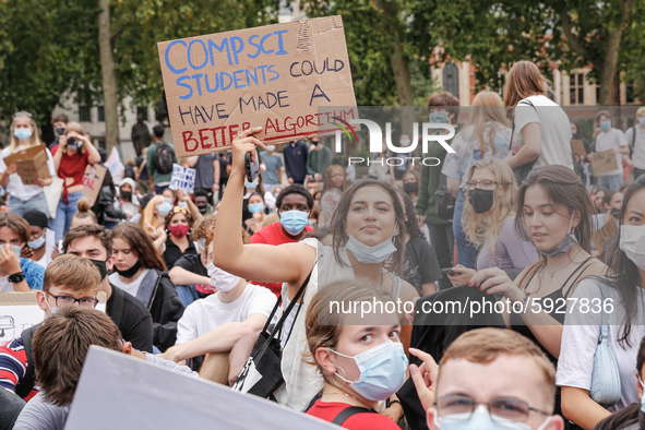 Youth protests at Parliament square against a new exam rating system which has been introduced in British education system - London, England...