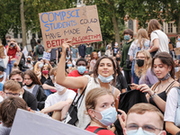 Youth protests at Parliament square against a new exam rating system which has been introduced in British education system - London, England...