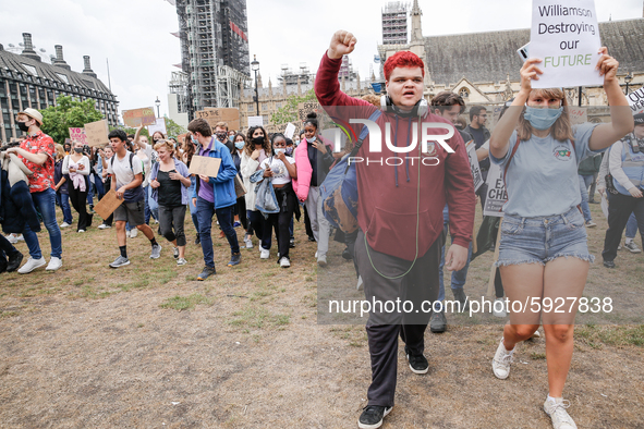 Youth protests at Parliament square against a new exam rating system which has been introduced in British education system - London, England...