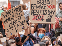 Youth protests in front of the Department for Education as a new exam rating system has been introduced in British education system - London...