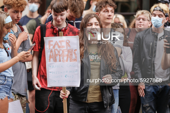 Youth protests in front of the Department for Education as a new exam rating system has been introduced in British education system - London...