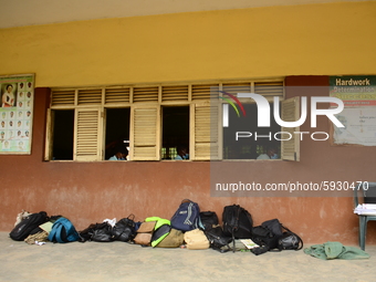 Final year students of Babs Fafunwa Millennium Senior Grammar School, Ojodu, Lagos, Nigeria, drop their bags outside their classroom as they...