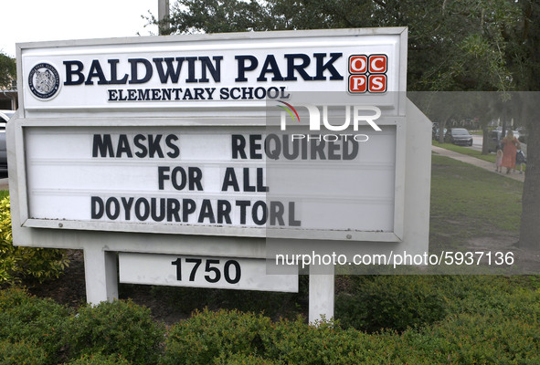 A sign is seen at Baldwin Park Elementary School as children return to school on the first day of in-person classes in Orange County on Augu...