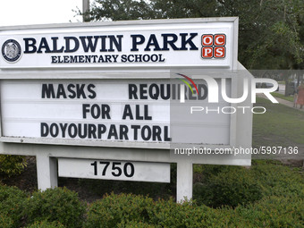 A sign is seen at Baldwin Park Elementary School as children return to school on the first day of in-person classes in Orange County on Augu...