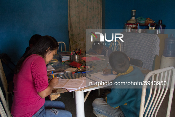 A student takes virtual classes and through the different television channels on August 24, 2020 in Mexico City, Mexico, during the new 2020...