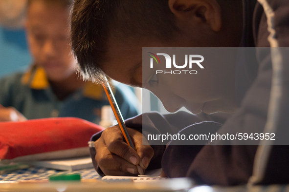 A student takes virtual classes and through the different television channels on August 24, 2020 in Mexico City, Mexico, during the new 2020...