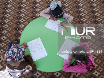 Syrian students take a math lesson in a refugee camp near Syrian-Turkish borders in Idlib, Syria, on August 25, 2020. (