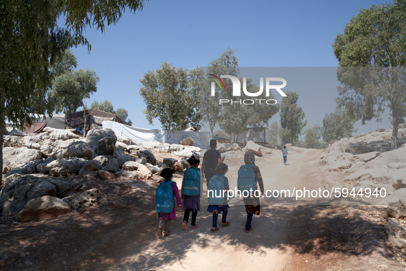 Syrian students leave the educational tent after taking a math lesson in a refugee camp near Syrian-Turkish borders in Idlib, Syria, on Augu...