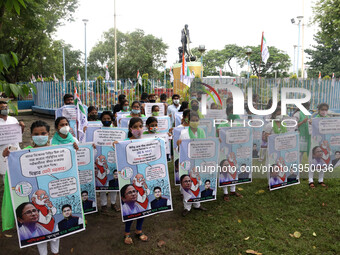 Students and Member of Trinamool Congress Chharta Parisad (TMCP) holds posters during a protest against the Union Government conducting JEE...