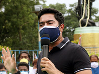 West Bengal Chief Minister Mamata Banerjee nephew and Trinamool Congress MP  Abhishek Banerjee addresses a protest against the Union Governm...