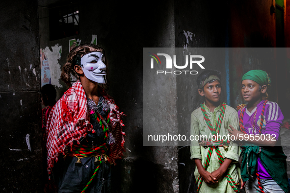 Young bihari's poses in front of the camera wearing the traditional attire in Dhaka, Bangladesh, on August 29, 2020.  