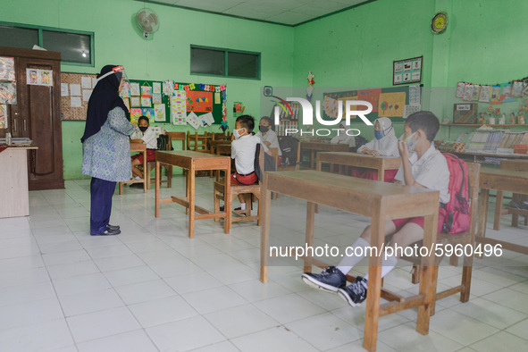 A teacher teach the students in a classroom at Candirejo Elementary School, Semarang Regency, Central Java, Indonesia, on September 1, 2020....