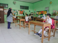 A teacher teach the students in a classroom at Candirejo Elementary School, Semarang Regency, Central Java, Indonesia, on September 1, 2020....