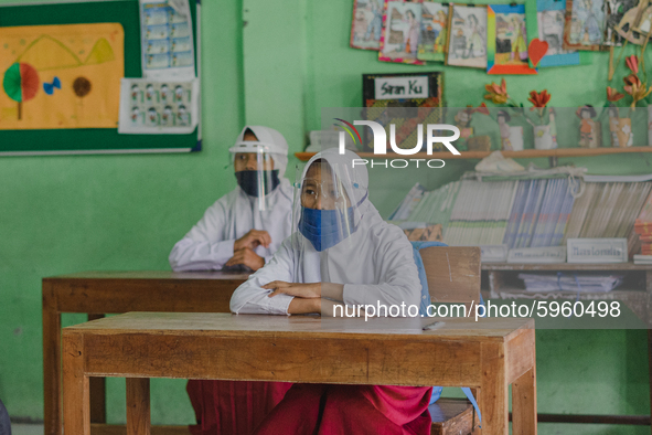 Students pay attention to the teacher at Candirejo Elementary School, Semarang Regency, Central Java, Indonesia, on September 1, 2020. Local...