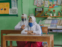 Students pay attention to the teacher at Candirejo Elementary School, Semarang Regency, Central Java, Indonesia, on September 1, 2020. Local...