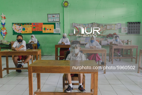 Students pay attention to the teacher at Candirejo Elementary School, Semarang Regency, Central Java, Indonesia, on September 1, 2020. Local...