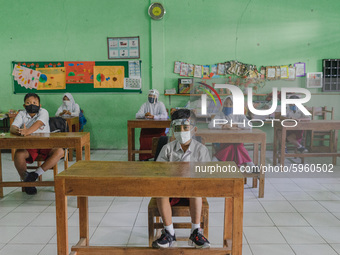 Students pay attention to the teacher at Candirejo Elementary School, Semarang Regency, Central Java, Indonesia, on September 1, 2020. Local...