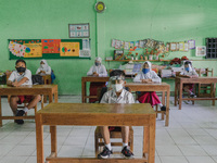 Students pay attention to the teacher at Candirejo Elementary School, Semarang Regency, Central Java, Indonesia, on September 1, 2020. Local...