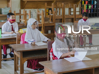 Students pay attention to the teacher at Candirejo Elementary School, Semarang Regency, Central Java, Indonesia, on September 1, 2020. Local...