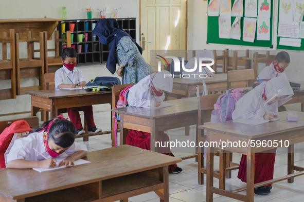 Students do their assignment at Candirejo Elementary School, Semarang Regency, Central Java, Indonesia, on September 1, 2020. Local governme...