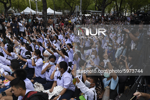 Thai students hold up a three finger salute as they protest against the government in front of the Ministry of Education, in Bangkok, Thaila...