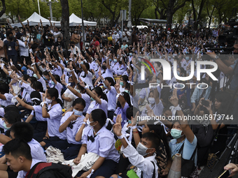 Thai students hold up a three finger salute as they protest against the government in front of the Ministry of Education, in Bangkok, Thaila...