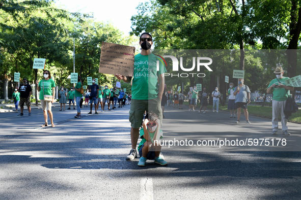 A protester hold a placard reading `If we do not prioritize or invest in education:How confront future pandemics, crises without researchers...