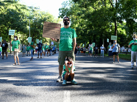 A protester hold a placard reading `If we do not prioritize or invest in education:How confront future pandemics, crises without researchers...