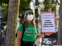 A protester hold a placard reading `On strike because we want to work without losing our livesin Madrid on 5th September, 2020. (