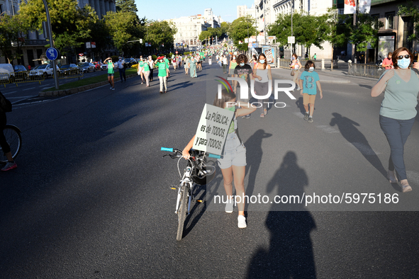 A protester hold a placard reading `Public education for all and for all´in Madrid on 5th September, 2020. 