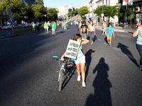 A protester hold a placard reading `Public education for all and for all´in Madrid on 5th September, 2020. (