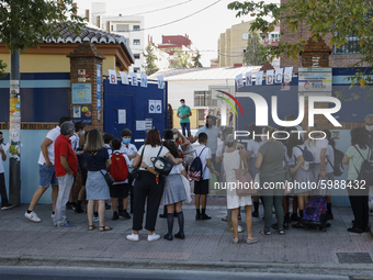 Many parents with their kids are waiting to enter to an education center during the first day of school on September 10, 2020 in Granada, Sp...