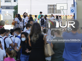 Many parents with their kids are waiting to enter to an education center during the first day of school on September 10, 2020 in Granada, Sp...