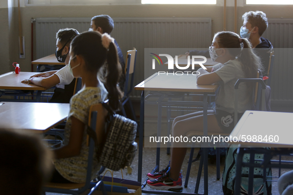 A group of students wearing facemasks at class during the first day of school on September 10, 2020 in Granada, Spain.  