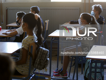 A group of students wearing facemasks at class during the first day of school on September 10, 2020 in Granada, Spain.  (