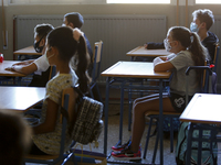 A group of students wearing facemasks at class during the first day of school on September 10, 2020 in Granada, Spain.  (