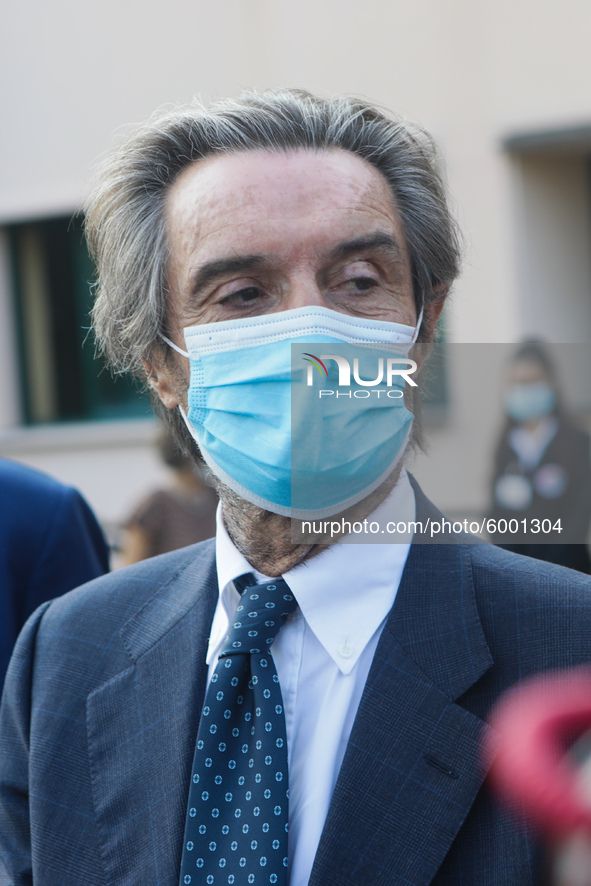 The President of Lombardy Region Attilio Fontana speaks to journalists during the visit to the Lagrange Institute in Milan during the reopen...