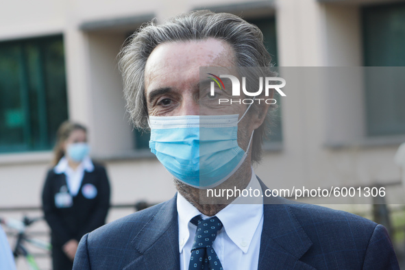 The President of Lombardy Region Attilio Fontana speaks to journalists during the visit to the Lagrange Institute in Milan during the reopen...